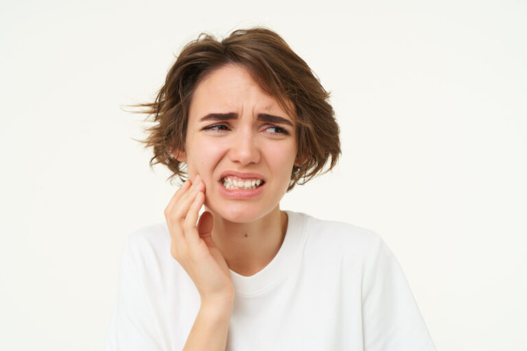 Woman experiencing tooth pain