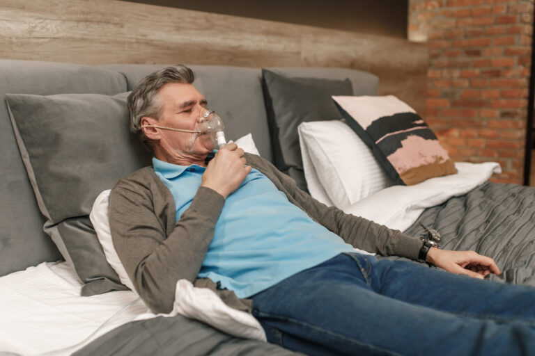 Man sleeping restfully after OSA treatment